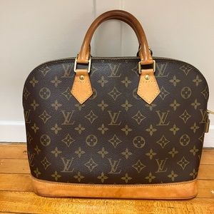 Louis Vuitton authentic classic Alma handbag. Coated canvas with leather detail.